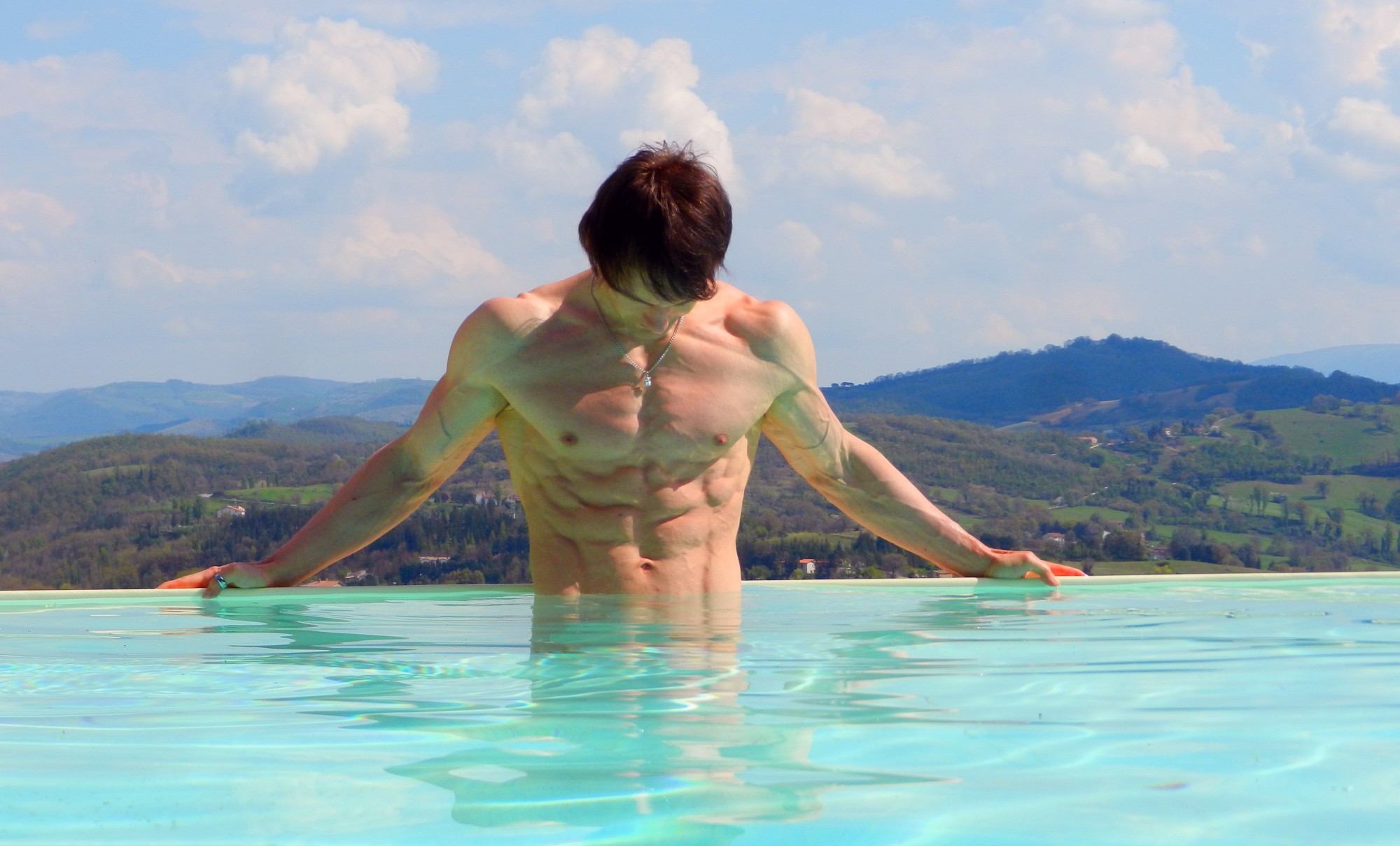 My hot boyfriend Michael in the infinity pool at Bellaugello